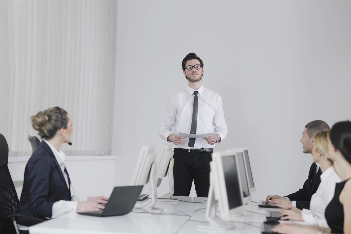 Offerings business-people-group-working-in-customer-and-help-desk-office-free-photo